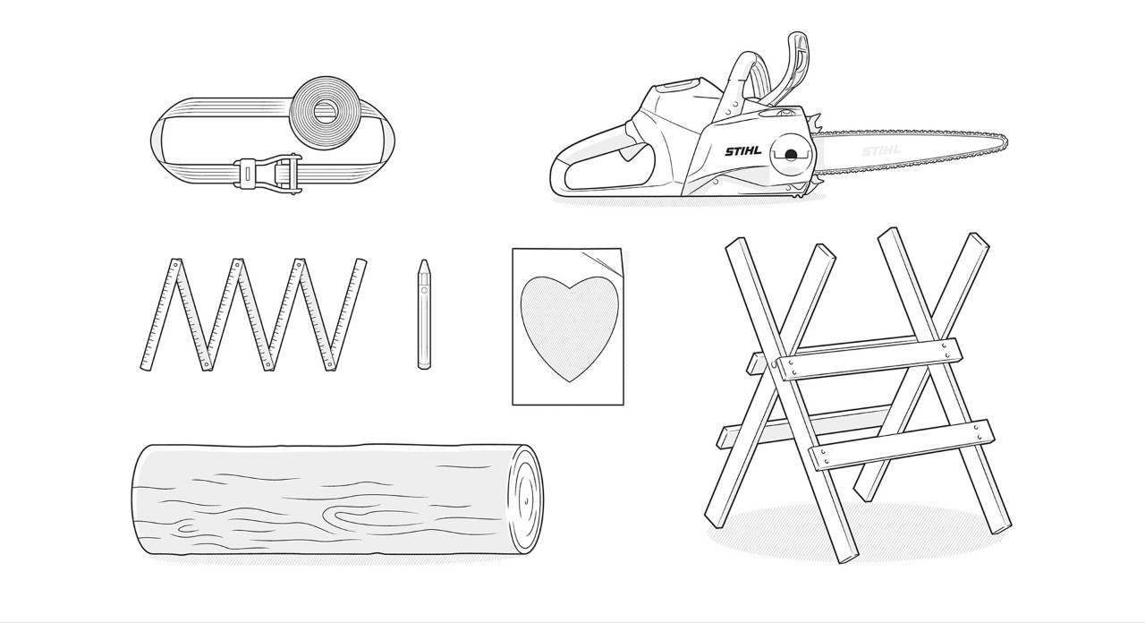 Ilustracja materiału: drewno okrągłe, pilarka spalinowa STIHL, calówka, pas mocujący, szablon w kształcie serca, koziołek do piłowania, ołówek